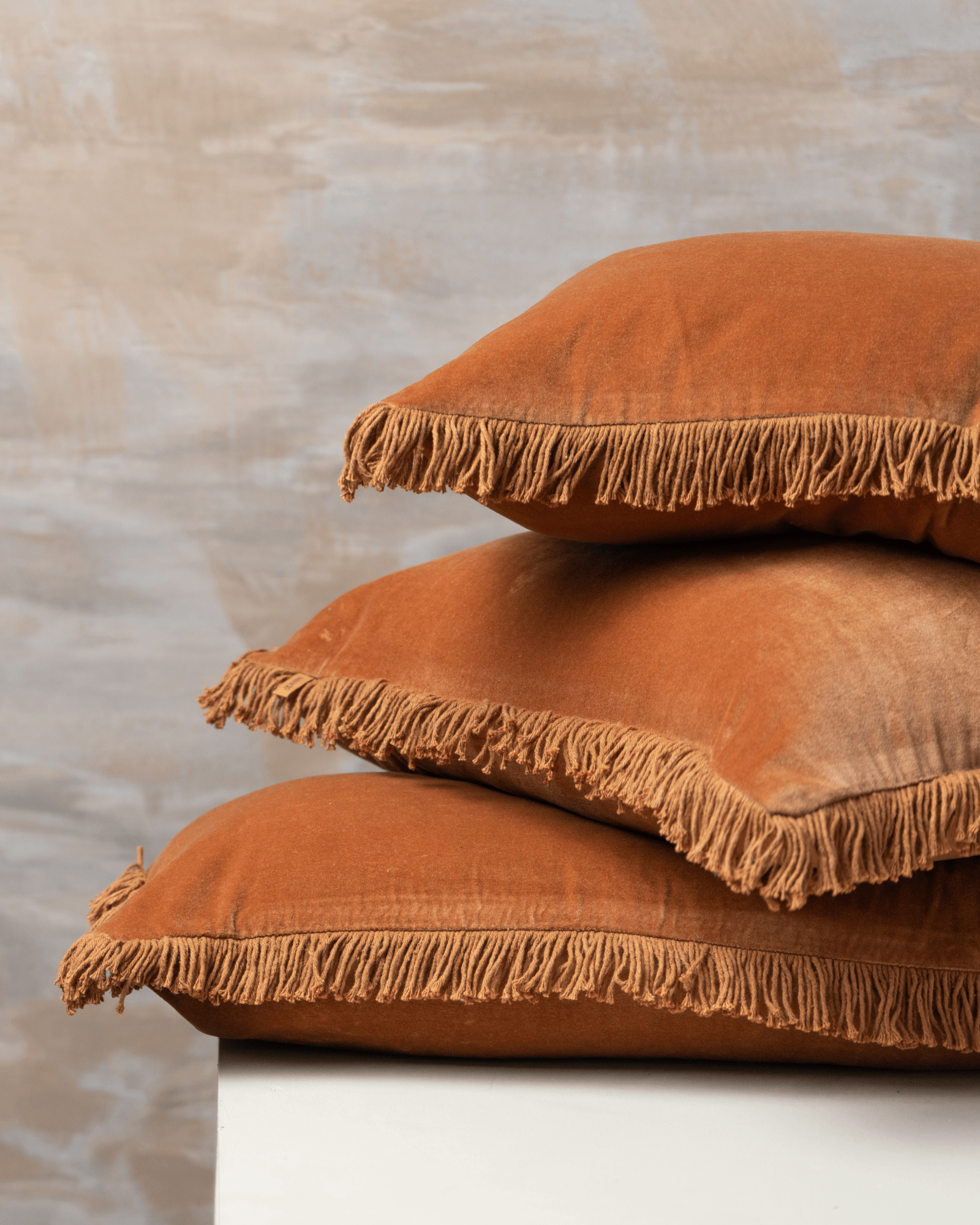 Velvet Bolster Fringed Cushion | Terracotta - - - Saardé - Saardé.