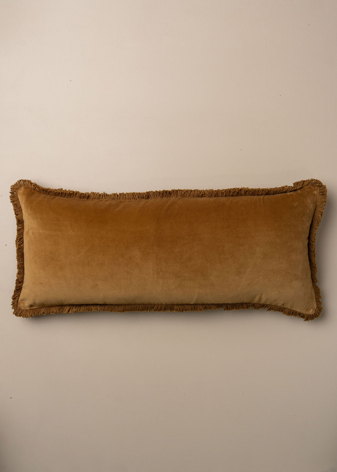 Velvet Bolster Fringed Cushion | Nutmeg - - - Saardé - Saardé.